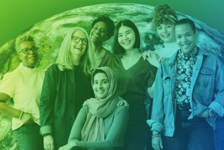 A group of diverse women smiling and laughing, standing in front of planet Earth with a green and blue filter