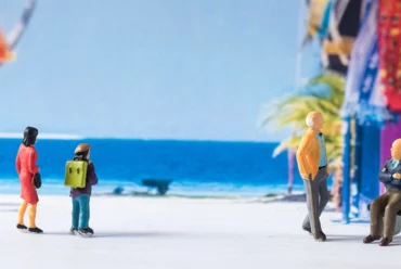 miniature figures at the beach