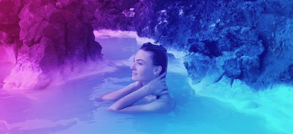A woman bathing in the Blue Lagoon in Iceland