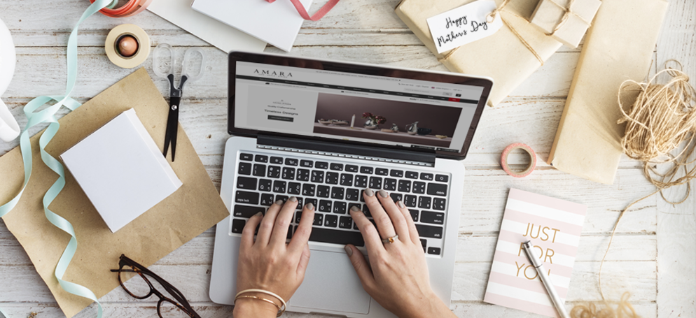 open laptop hands typing top view