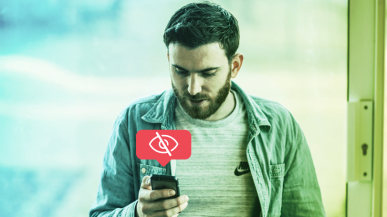 man looking at phone
