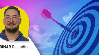 A graphic of a dart hitting the bullseye of a target. A portrait photo of Jules Bodoulé Sosso, our Head of Paid Media.