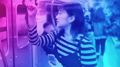 A woman on a South Korean subway train