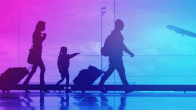 people at airport with suitcase