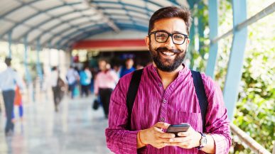 man smiling in public