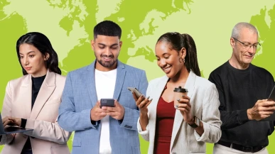 A group of diverse people using phones, laptops and tablets with a world map in the background.