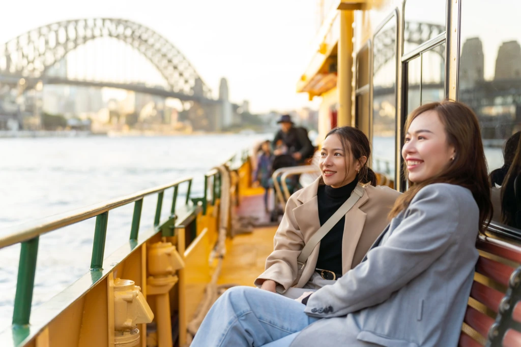 Two women on a boat in Sydney Harbour