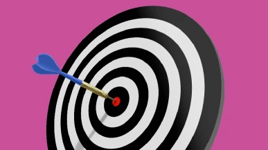 A target with a dart in the bullseye