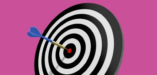 A target with a dart in the bullseye